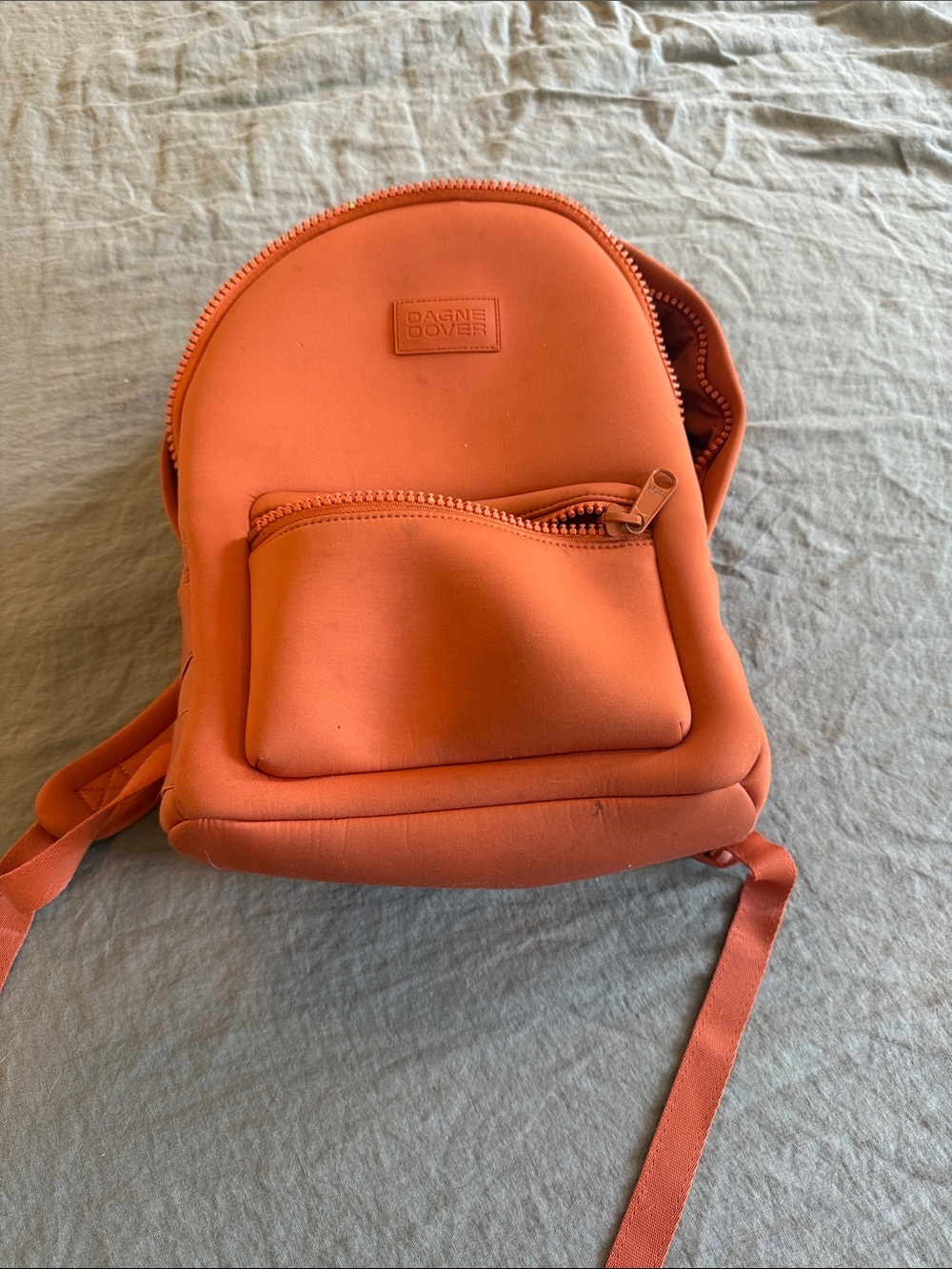 Dagne Dover Orange Mini Backpack with Front Zip Pocket